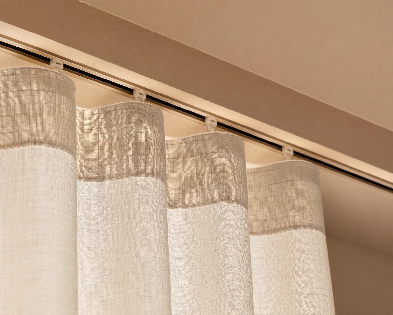 Concealed ceiling wave curtain track with silicone glides