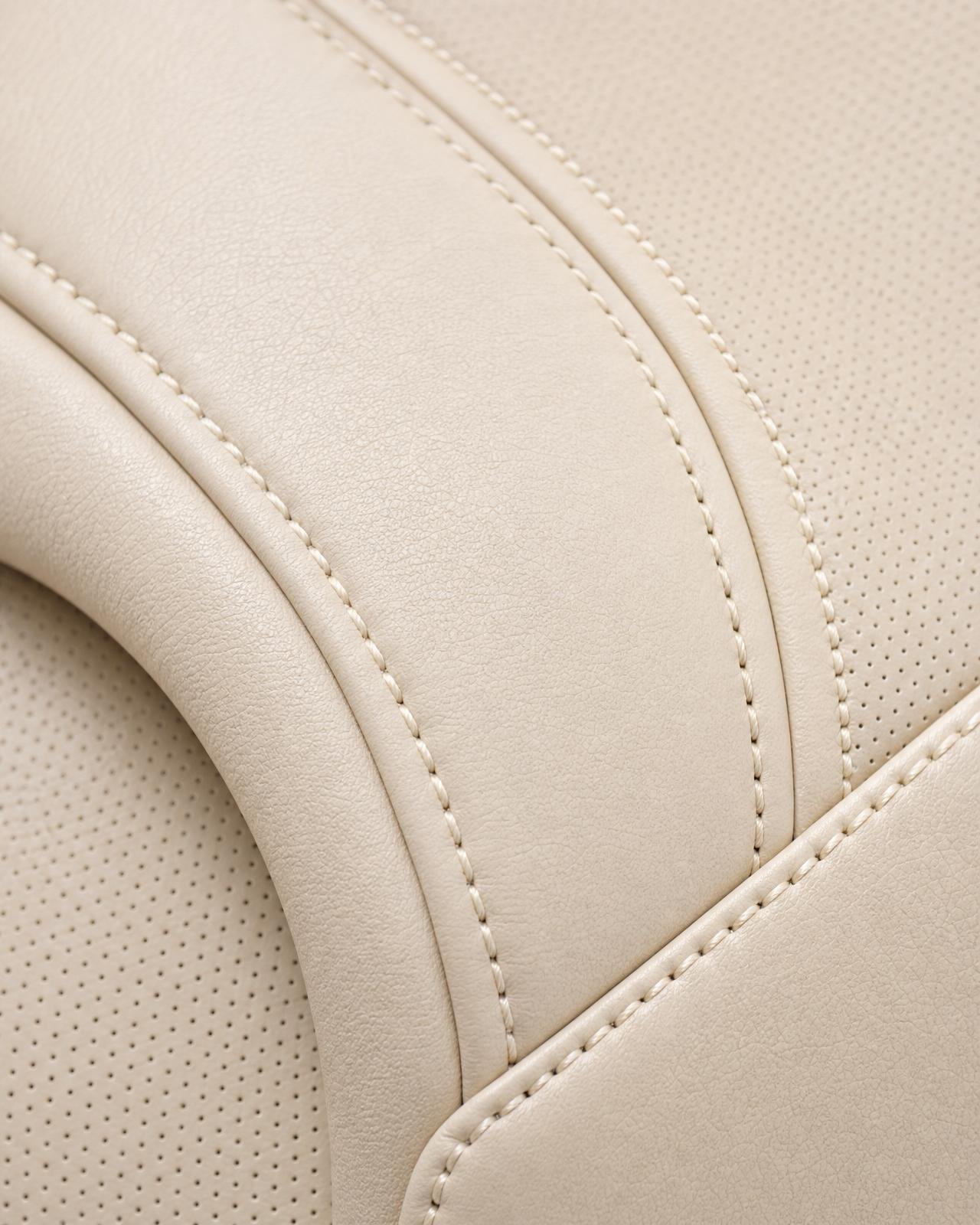 Macro of marine-grade ivory leather upholstery with double stitched seam